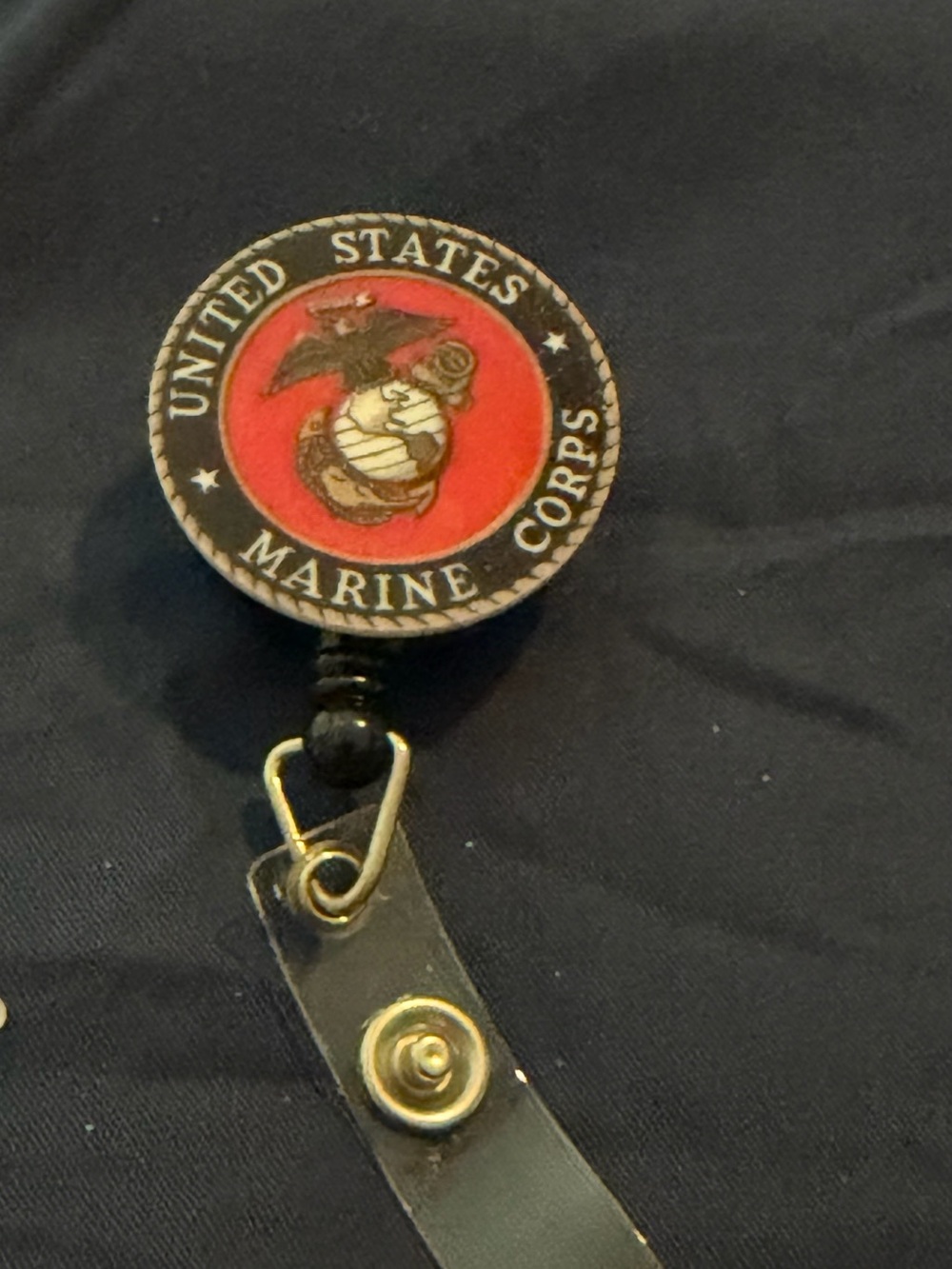 United States Marine Corps Black & Red Badge Reel